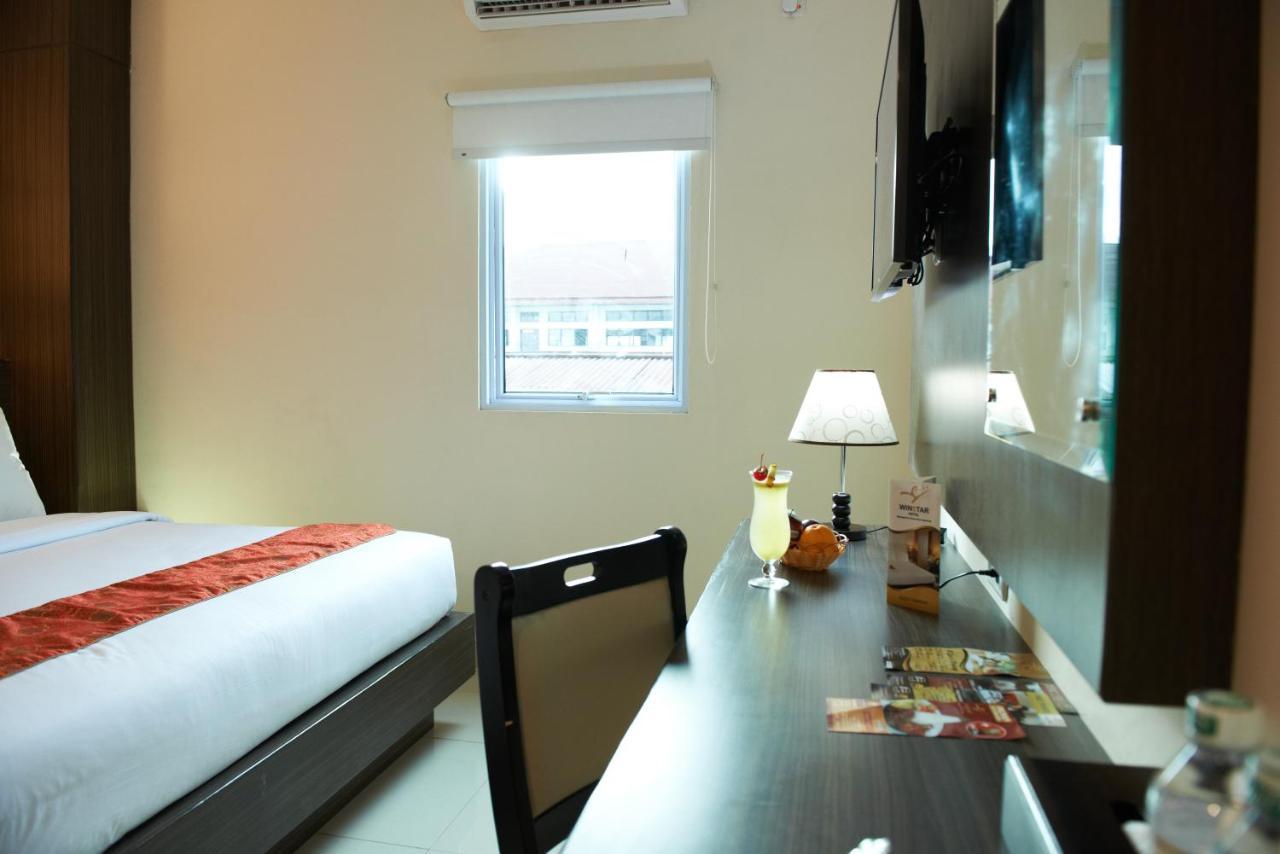 Winstar Hotel Пеканбару Екстериор снимка